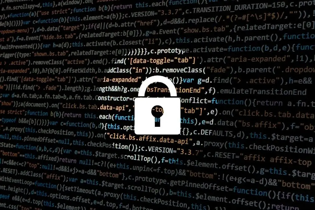a padlock is surrounded by a bunch of code