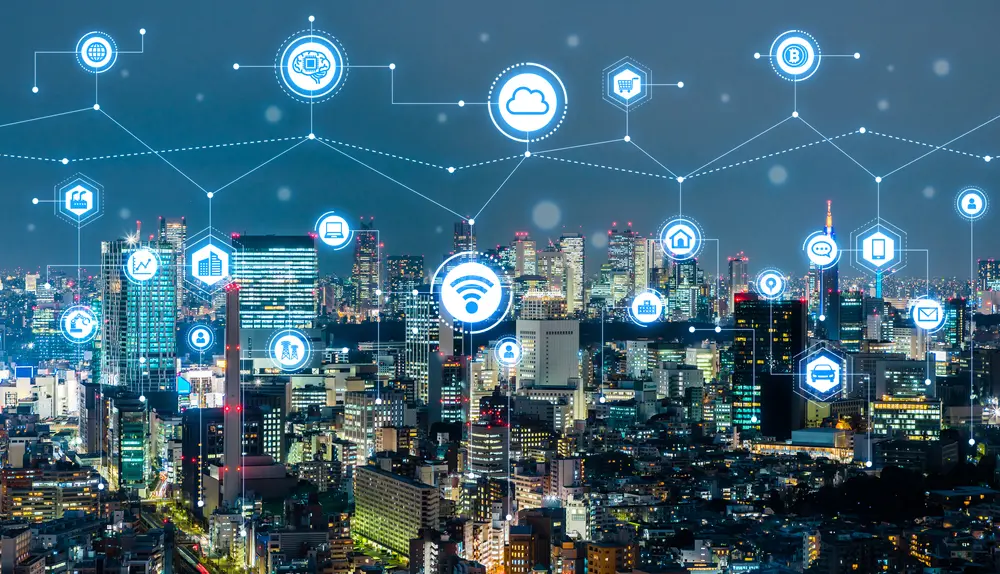 Aerial view of a city with neon icons throughout the image