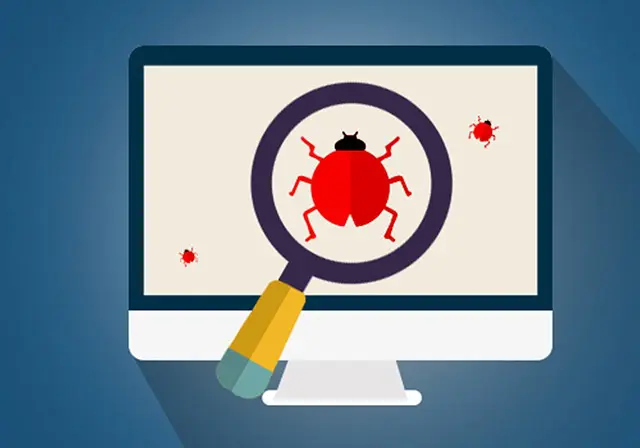 a magnifying glass shows a bug on a computer screen