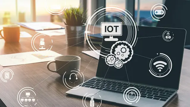 a laptop with a screen that says iot on it