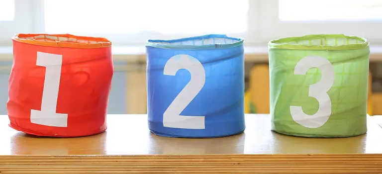 Three colorful bins with the numbers 1, 2 and 3 on them