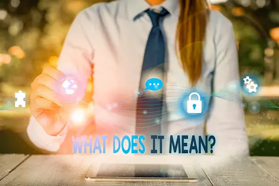 a woman is using a tablet computer to answer the question what does it mean