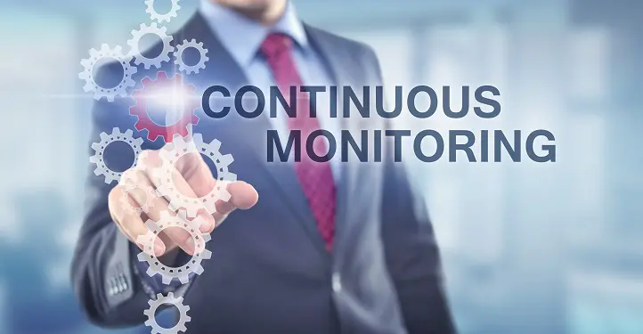 a index finger pointing towards gears beside the words 'continuous monitoring'
