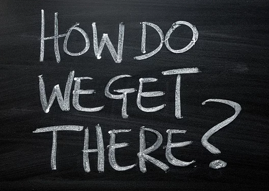 a blackboard with the words how do we get there written in white chalk