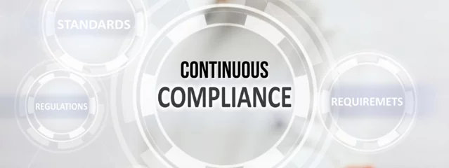 a person is pressing a button that says continuous compliance