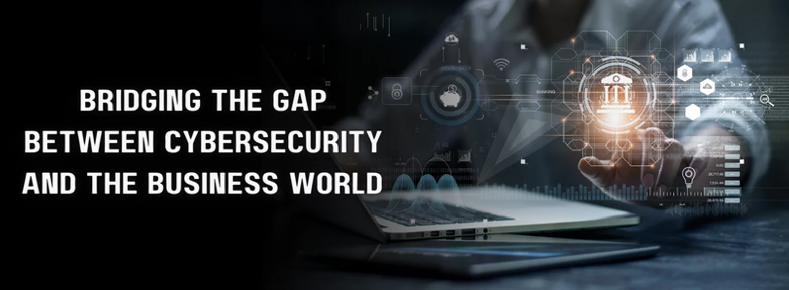 person using a laptop with the words bridging the gap between cybersecurity and the business world
