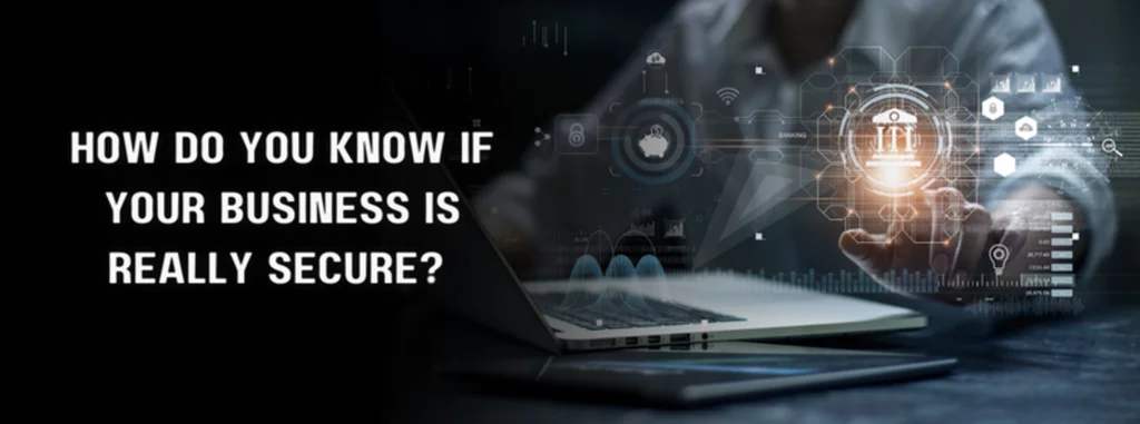 a person typing on a laptop with text saying "how do you know if your business is really secure"